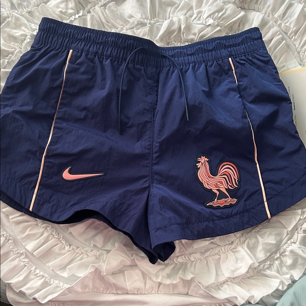 Nike Women's Dark Blue Athletic Shorts with Pink Accents